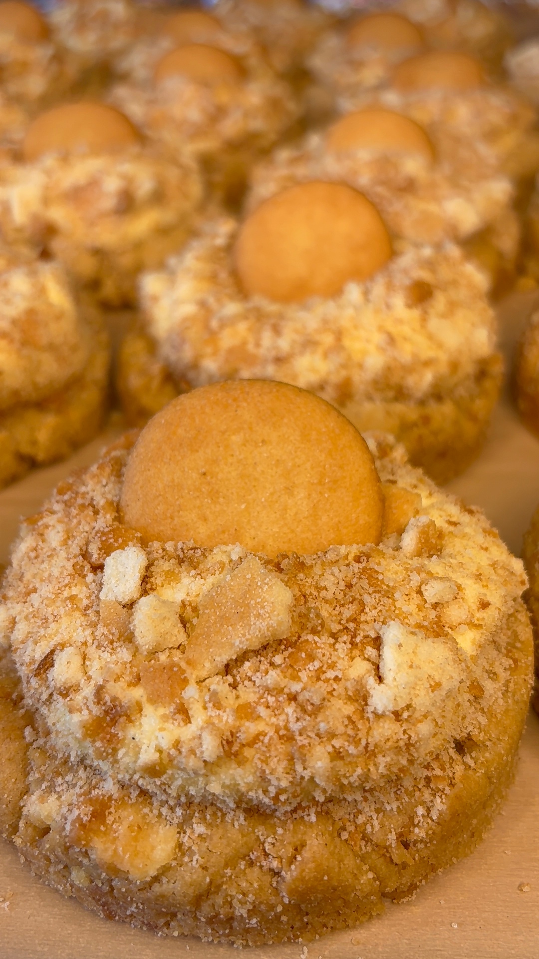 Banana pudding cookies topped with vanilla wafers and crumble